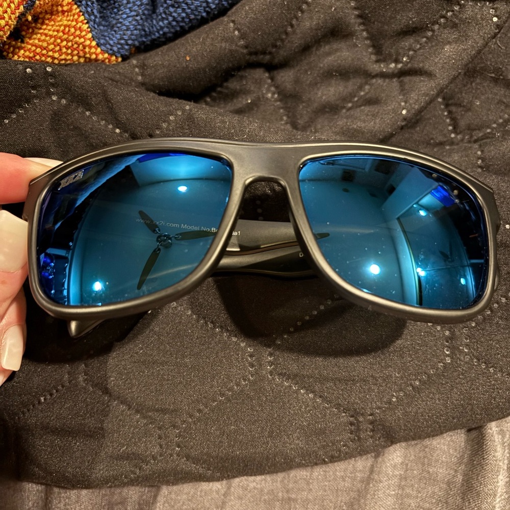 Stylish Black Sunglasses with Blue Lenses